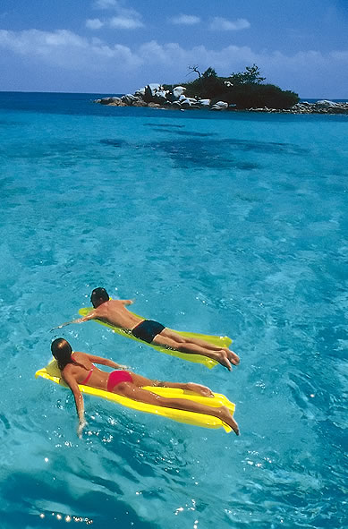 Couple relax on a lilo